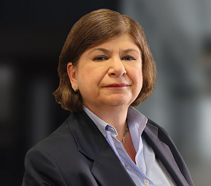 Anna Orgera ’83. Link to her story