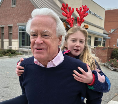 Joe Wilson ’68 with his granddaughter
