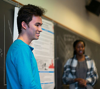 Students presenting in class. Links to Donor-Advised Funds Students presenting in class. Links to Donor-Advised Funds